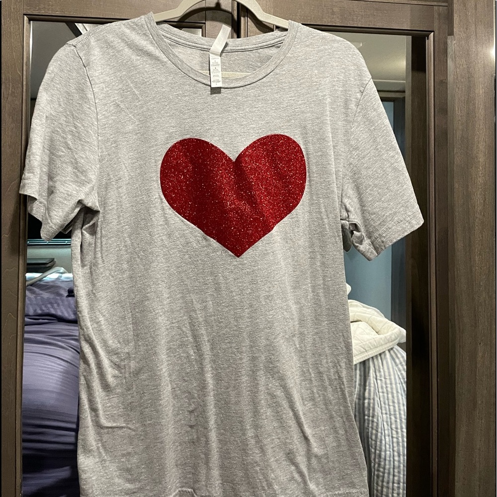 A nice long t shirt with a heart on it.